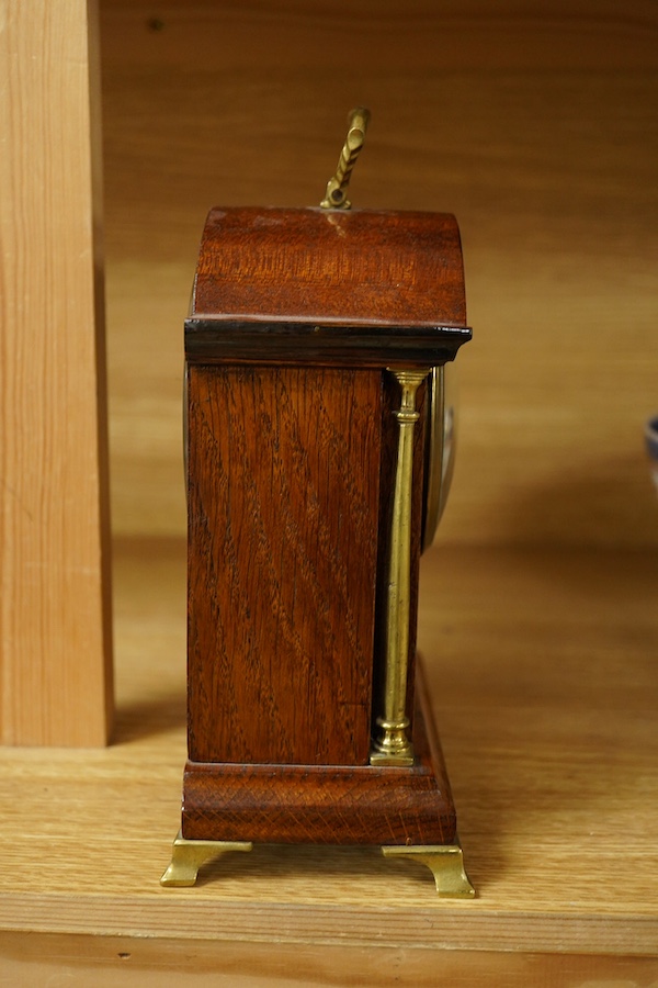 An Edwardian inlaid mantel timepiece, R. C. Marsh, Birmingham, 24cm high. Condition - poor/fair, glass cracked